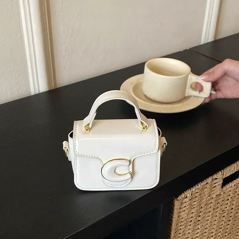 Mini Structured Top Handle Bag with Embossed Logo Detail