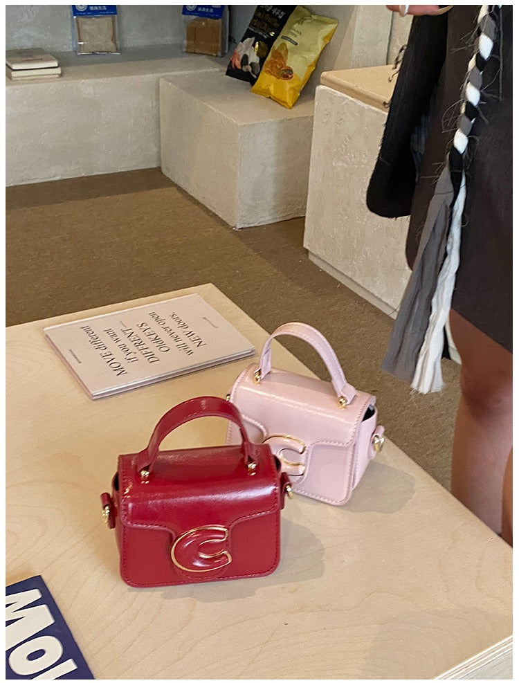 Mini Structured Top Handle Bag with Embossed Logo Detail