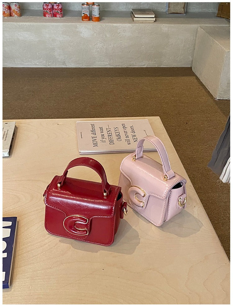 Mini Structured Top Handle Bag with Embossed Logo Detail
